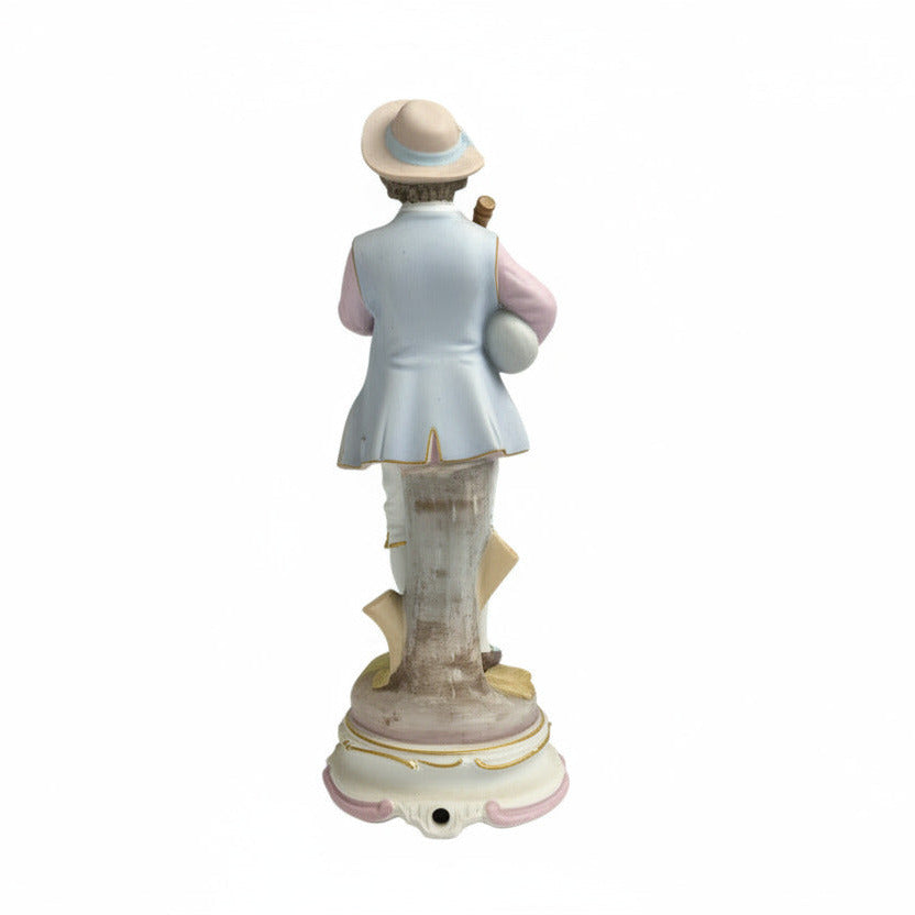 Statue of a person in a uniform with a hat on a white background