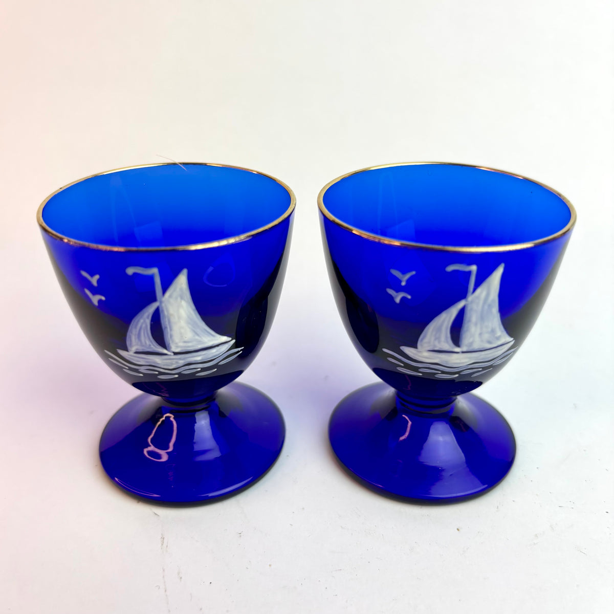 Pair Vintage Bristol Blue Style Glass Goblets with Hand-Painted Sailing Ships & Gilt Rims