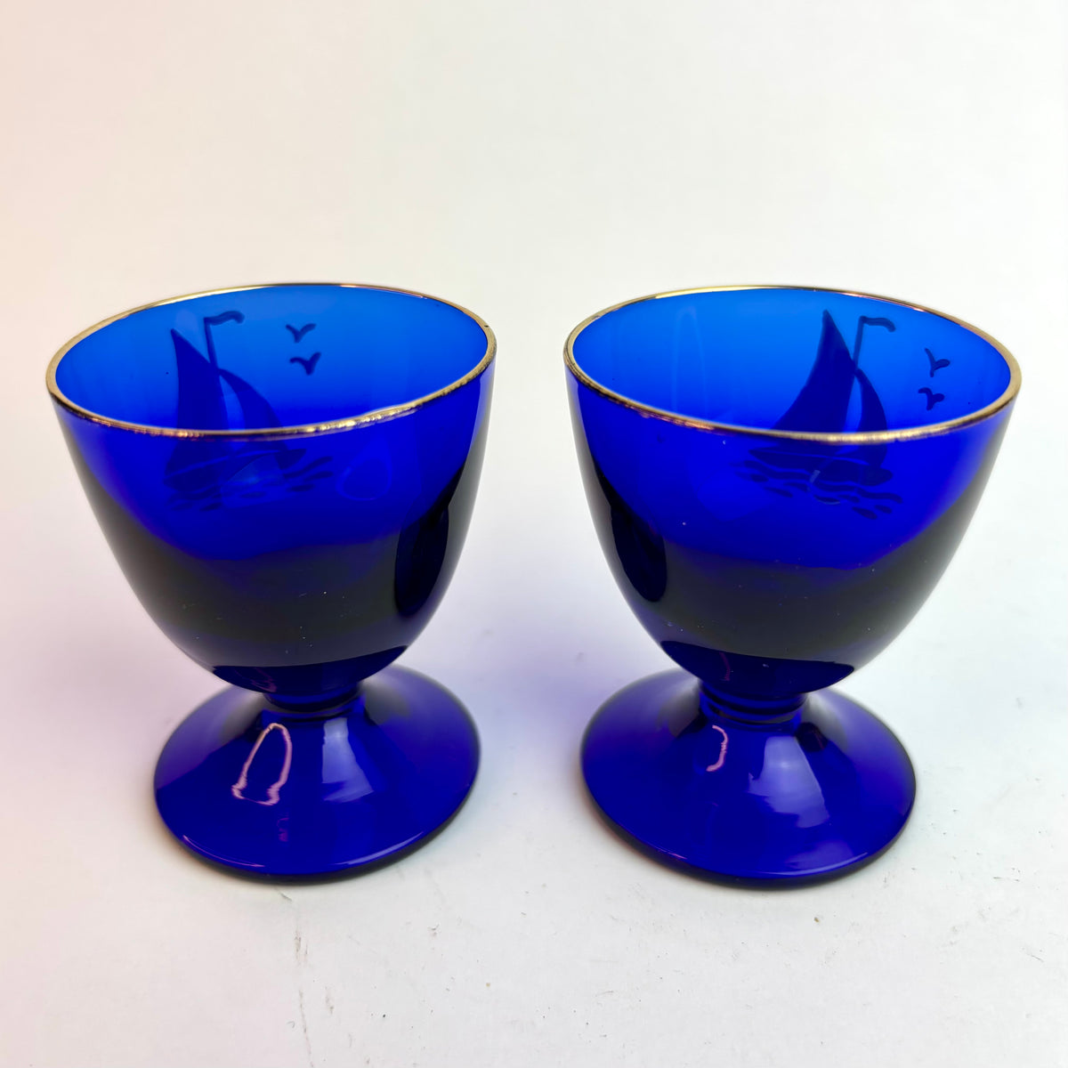 Pair Vintage Bristol Blue Style Glass Goblets with Hand-Painted Sailing Ships & Gilt Rims