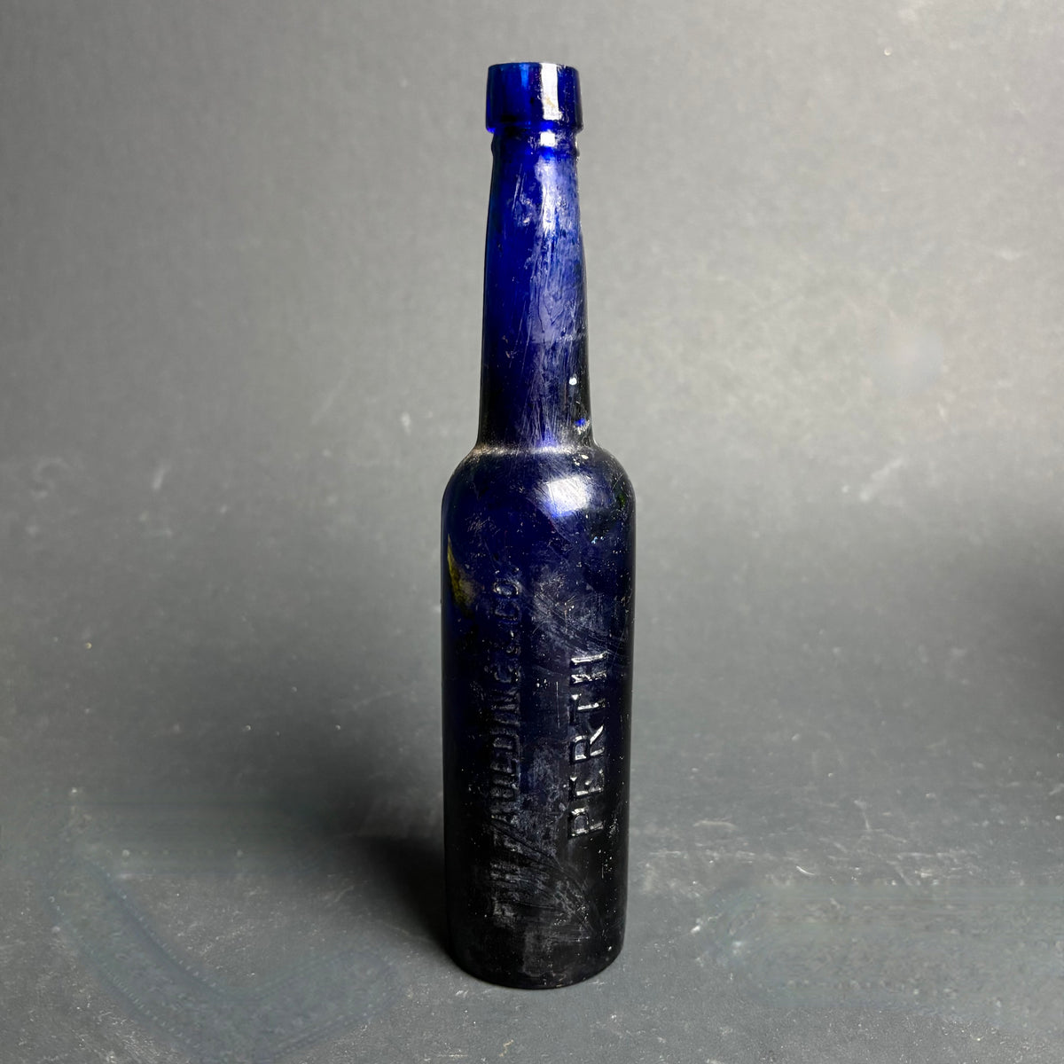 Antique Cobalt Blue Glass Bottle – Faulding & Co Ltd Perth – Embossed Chemist Bottle