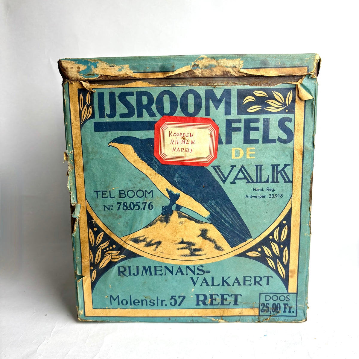 Vintage box with decorative design and text on a white background