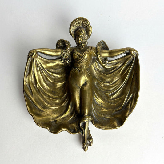 Bronze angel figurine on a white background