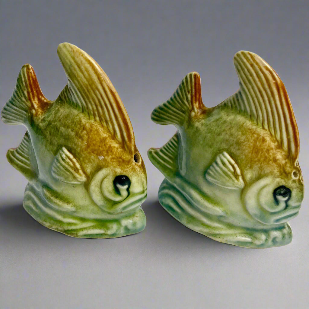 A pair of Darbyshire Pottery ceramic salt and pepper shakers designed to look like fish.